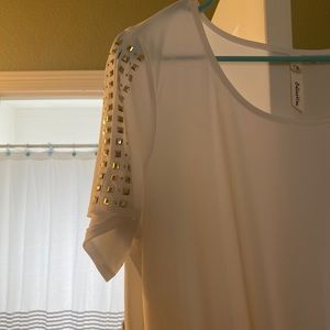 White top with embellishments